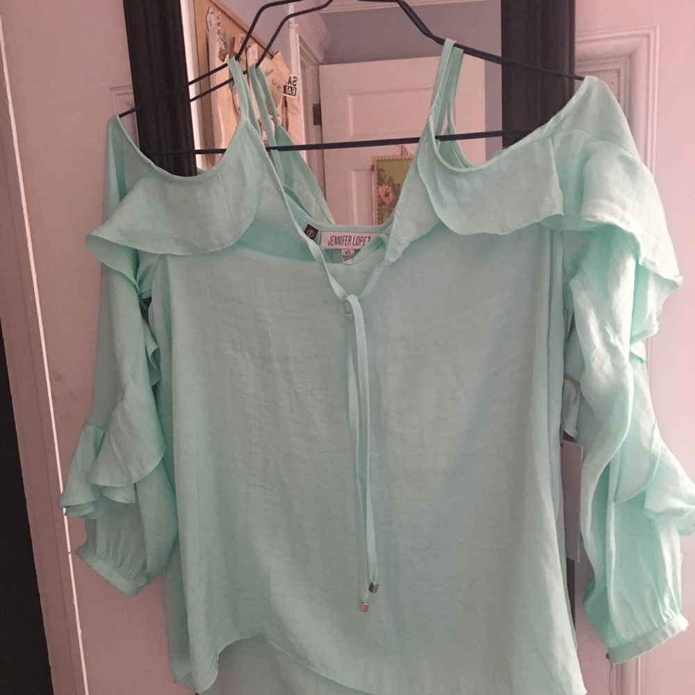 Jennifer Lopez cold shoulder blouse